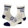 Custom woven mini crew athletic socks in cream and navy with “Cincy Open” text and tennis logo design on footbed